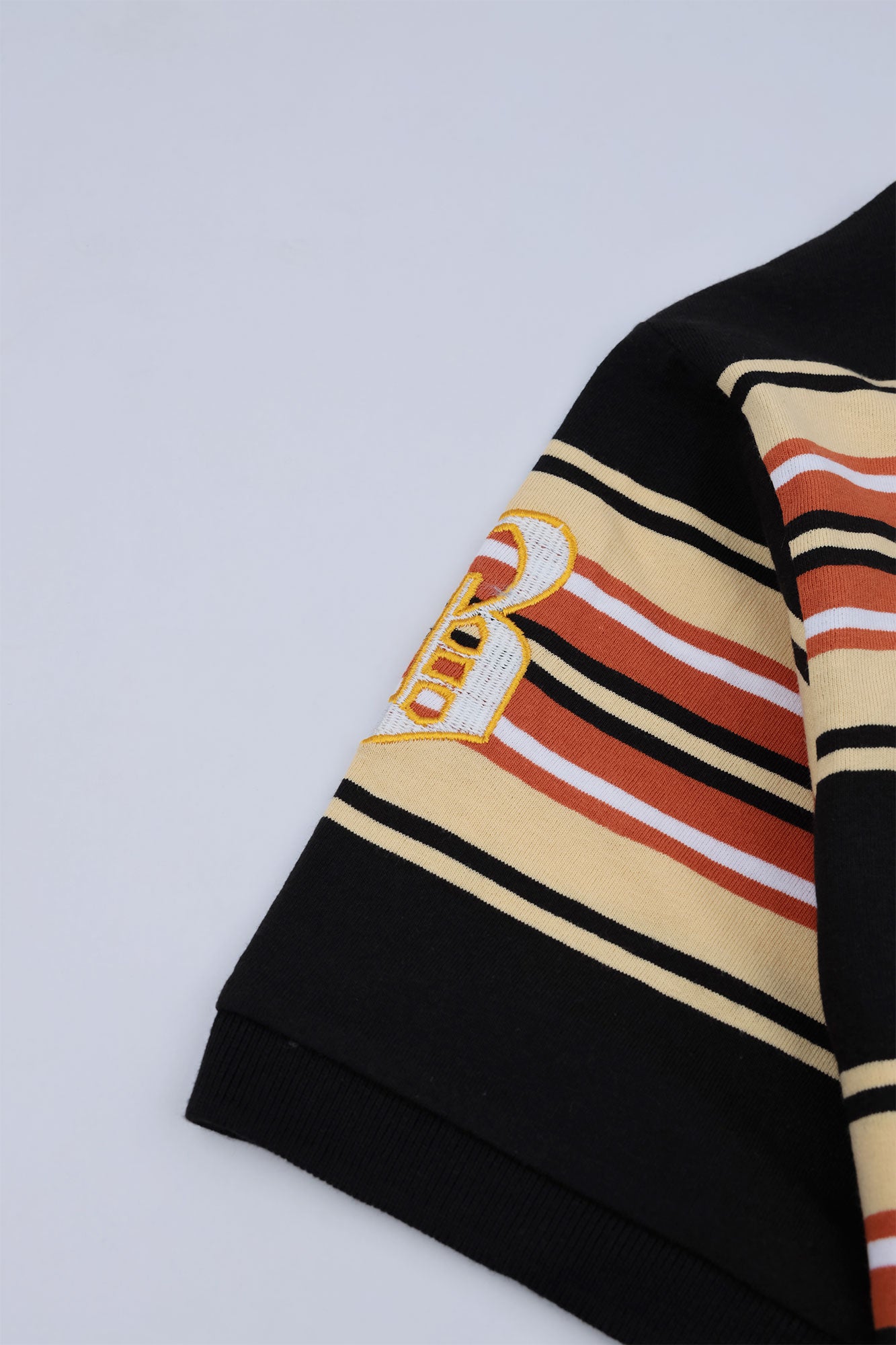 Men’s Varsity Striped Polo